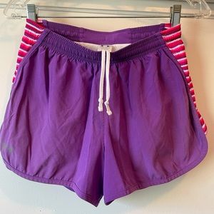 Under Armour purple running shorts